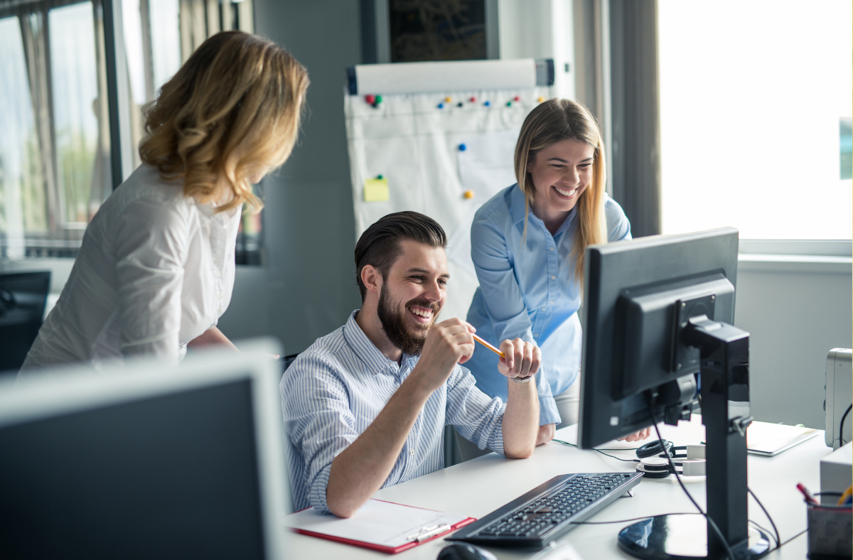 Untitled (1200 x 788 px) (14) People looking at a computer.
