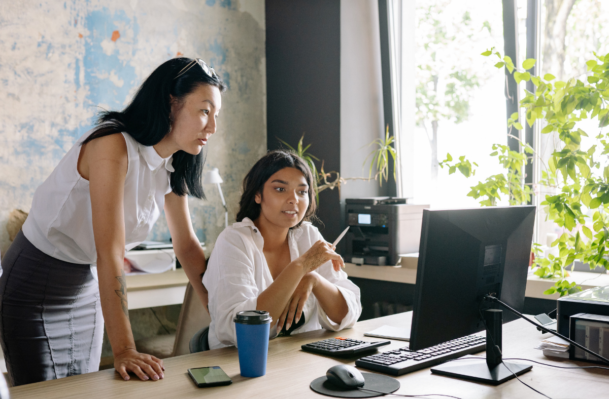 Two people at a computer